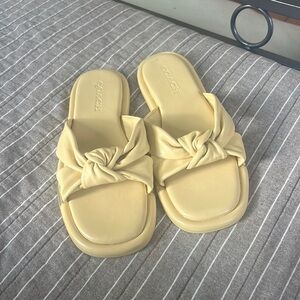 Yellow coach sandals